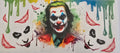 Joker wrap with dripping paint and smiling faces.