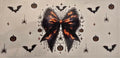 Black and orange Halloween bow with bats, spiders, and pumpkins