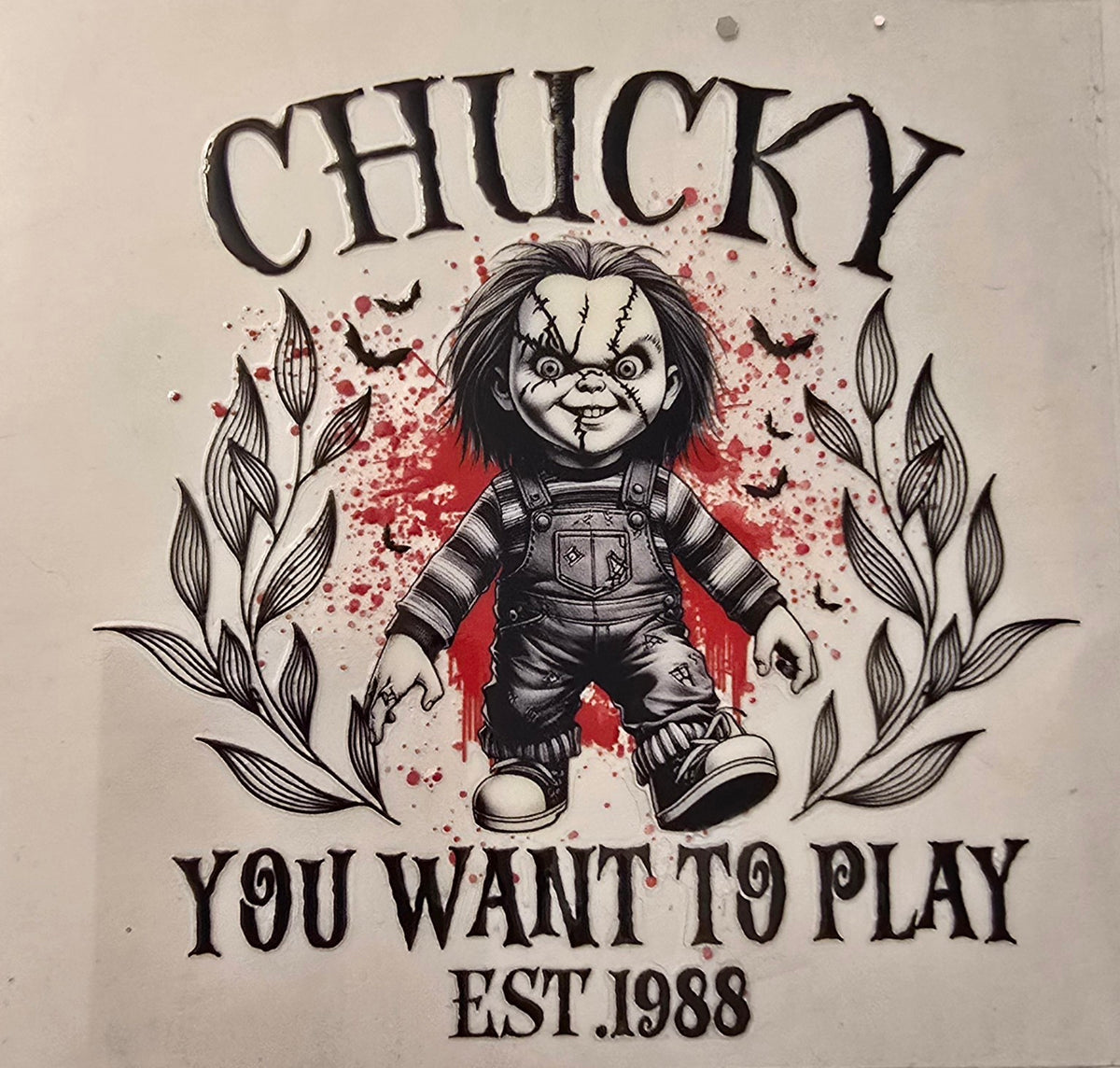 Chucky with You Want to Play and Est. 1988 text