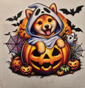 Halloween puppy in ghost costume with pumpkin