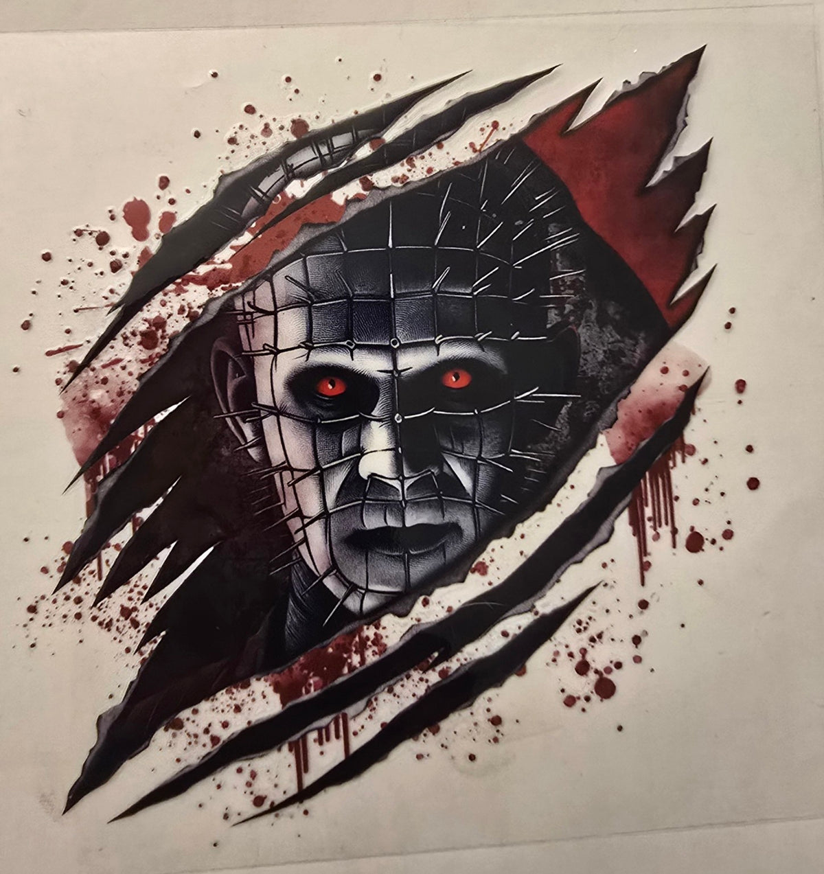 Pinhead from Hellraiser in a bloody slash design